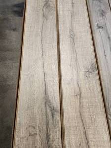 lot 5 image: 14-Boxes of 12mm Wood Laminate Flooring (Approx. 235sf)