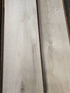 lot 8 image: 15-Boxes of 12mm Wood Laminate Flooring (Approx. 295sf)