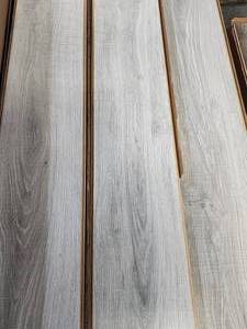 lot 11 image: 11-Boxes of 12mm Wood Laminate Flooring (Approx.185sf)