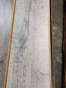 lot 16 image: 6-Boxes of 12mm Wood Laminate Flooring (Approx. 100sf)