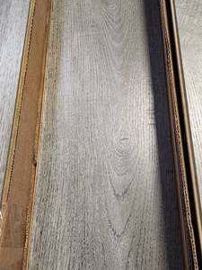 lot 17 image: 11-Boxes of 10mm Wood Laminate Flooring (Approx. 215sf)
