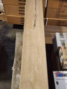 lot 26 image: 6-Boxes of 6x36 Peak Brown Wood Look Porcelain Tile (Approx. 75sf)