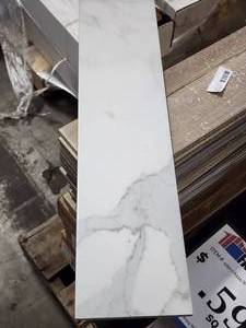 lot 27 image: 1-Box of 6x24 Dimarmi Bianco Marble Look Porcelain Tile (Approx. 15sf)