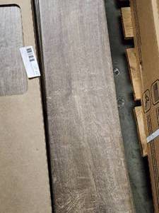 lot 30 image: 3-Boxes of 6x36 Dark Brown Wood Look Porcelain Tile (Approx. 39sf)