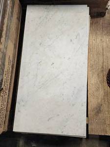 lot 40 image: 2-Boxes of 12x24 Bianco Carrara Porcelain Tile (Approx. 31sf)