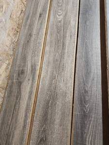 lot 56 image: 23-Boxes of 12mm Wood Laminate Flooring (Approx. 380sf)