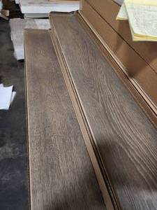 lot 98 image: 11-Boxes of 12mm Wood Laminate Flooring (Approx. 186sf)