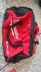 lot 97 image: Milwaukee Red and Black Contractor Tool Bag 17 - Retail $45
