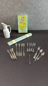 lot 1030 image: Flatware Lot with Ceramic Pitcher Napkins Box Decorative Spoon