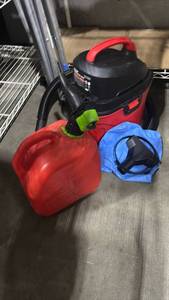 lot 1053 image: Bauer 3 Gallon Wet Dry Vacuum Model 1084E-B3 130 VAC 60 Hz and Gas Container