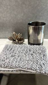 lot 1067 image: Metallic Waste Can  with Gray Textured Bath Mat and Dried Botanicals