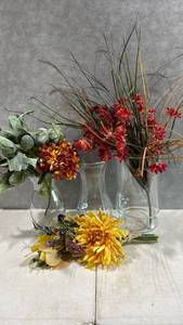 lot 1085 image: Three Glass Vases with Faux Flowers