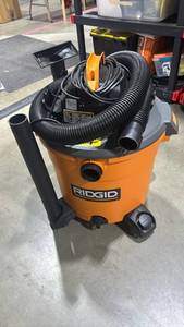 lot 1109 image: RIDGID WetDry Vacuum with Hose and Attachments