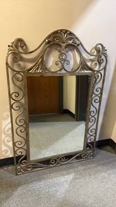 lot 1208 image: Heavy metal framed beveled mirror 45 x 30 in