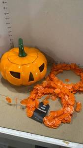 lot 2010 image: Ceramic jack-o-lantern, 12in diameter and garland