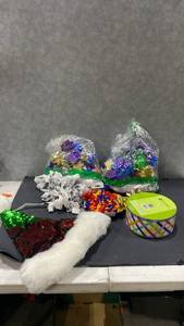 lot 2045 image: Holiday bows ribbon and a sequined Santa hat