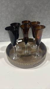 lot 4000 image: 6-Piece Smoke and Amber Glass Champagne Flute Set with Textured Tray