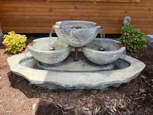 lot 103 image: Tiered Coco Spill Fountain by Henri Studio 27 x 56 x 28 in. VERY HEAVY