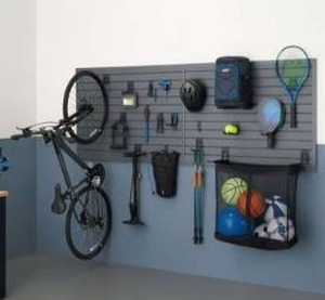 lot 12898 image: Trinity 24 Sq Ft Modular Slatwall 19-Piece Accessory Sports Set TUPXGR-0714
