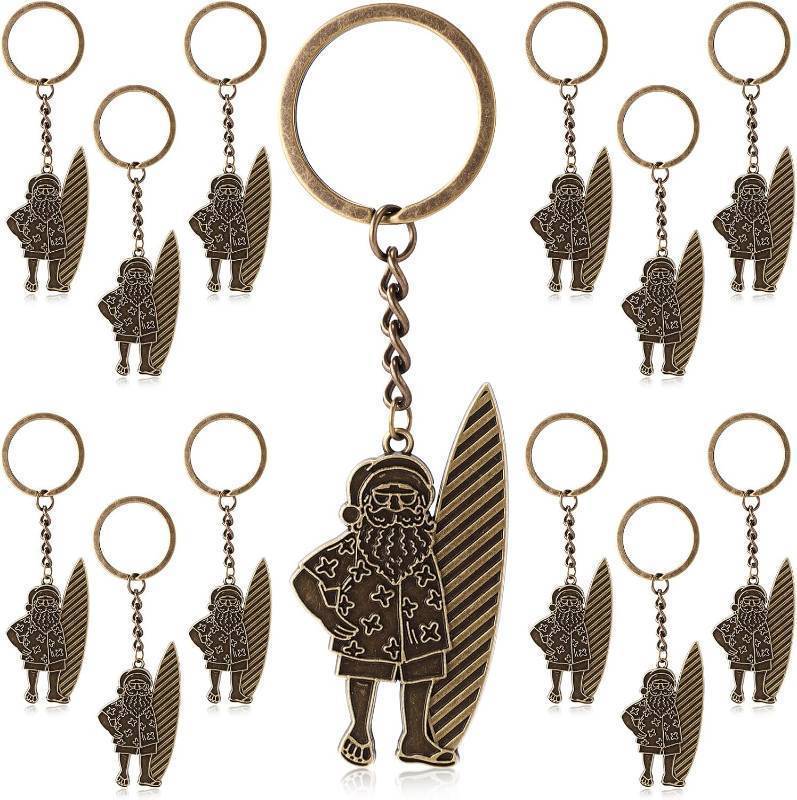 lot 68031 image: approx. 2.6 x 0.98 inches 6.6 x 2.5 cm Equsion 12 Pcs Christmas in July Summer Party Favor Surfing Santa Keychain Ornament Beach Gifts for Women Men Santa Gifts for Family, Friends, Colleagues