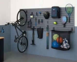lot 13023 image: Trinity 24 Sq Ft Modular Slatwall 19-Piece Accessory Sports Set TUPXGR-0714