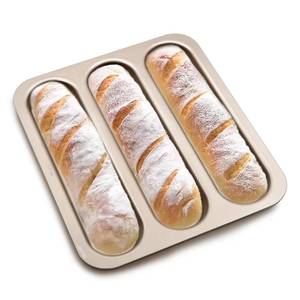 lot 2325 image: BSDLZCH French Baguette Bread Baking Pan, 3-Cavity Non-stick Loaf Pan - Retail $20