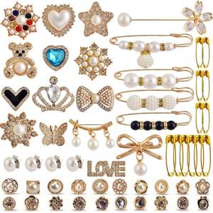 lot 2376 image: Charms for Socks Safety Pin Brooch,55pcs Junk Sock Charms Pins Gold Bling Sock Jewelry Charms,Brooch Pins for Socks,Pearl Rhinestone Brooch Pins Costom Shoe Sock Charms Kit Bulk for Hat Clothes - Retail $670