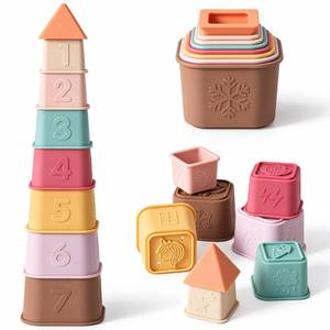 lot 2410 image: YIVEKO Baby Stacking Cups Toy, Silicone Stacking Tower Educational Baby Toys 6M, Soft Teething Building Blocks 8 Pcs, BPA Free Sensory Infant Toy, Bath & Beach Toys, Vintage Neutral Colors-Vintage - Retail $10