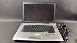 lot 16 image: Toshiba Satellite L455D-S5976 15.6 Laptop and ACDC Adapter. Works, Needs a Factory Reset