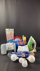 lot 17 image: Household Supplies Lot Space Saver Hangers Steel Wool Pads Food Storage Containers Lots of Reynolds Wrap LED Bulbs Iron