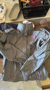 lot 28 image: All in Great Shape The North Face Ladies Medium Rain Jacket with Folding Hood in the Collar. Nike Mens Medium Hoodie, Ladies Under Armor Medium Hoodie