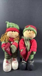lot 78 image: Pair of Christmas Caroler Dolls with Red and Green Clothing and Song Books Weighted Feet for Standing