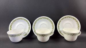 lot 97 image: Corelle Spring Blossom aka Crazy Daisy 3 Teacups and Saucers with Green Floral Band