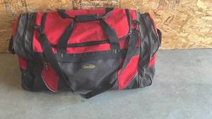 lot 247 image: Like New Rolling Duffel Bag - Great for Sports