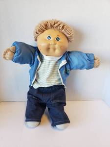 lot 300 image: Cabbage Patch Kids Doll with Blue Jacket and Denim Pants