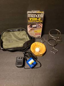 lot 322 image: Maxell VHS-C Cassette Adapter with Vintage Catchers Mitt Ashtray, Tanganyika Fanny Pack, Water Pump & Drunk Ckicken Holder Lot