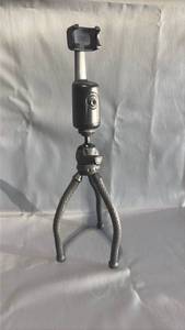 lot 260 image: Automatic Face Tracking Tripod, 360° Rotating Smartphone Gimbal StabilizeOctopus Legs Wrap Around ANYTHING