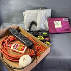 lot 536 image: Assorted Lot Tape Measures, Nebo Mycro 400 Cap Clip Light, Power Strip, Extension Cord, Locking Cash Bag