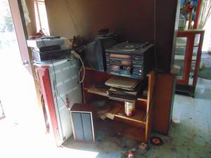 lot 3074 image: Contents of Corner - TVDVDVHS Player - Stereo - Records and More
