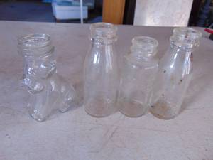 lot 3976 image: Battery oil bottles