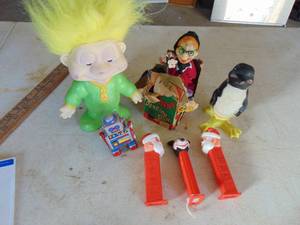 lot 3980 image: Troll doll, Pez dispensers and windup