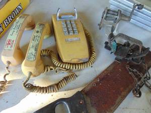 lot 3118 image: Leg Trap - Telephones and Pencil Sharpener