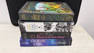 lot 124 image: Lot of 4 Paperback Novels