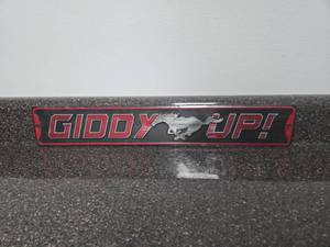 lot 252 image: Ford Mustang Giddy Up Metal Sign 20 x 3.33 inches