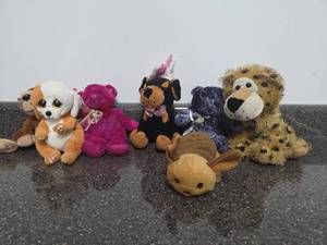 lot 253 image: Lot of  Plush Stuffed Animal Toys Dogs Lion Rabbit