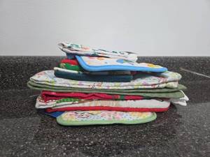 lot 258 image: Kids Towels Oven Mitts Washclothes Assorted Colors and Prints