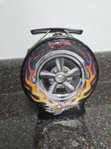 lot 275 image: Vintage Metal Hot Wheels Collectible Car Case with Flame Design and Wheel Display
