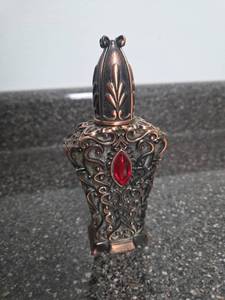 lot 304 image: Decorative Perfume Bottle with Red Stone Accent and Removable Cap