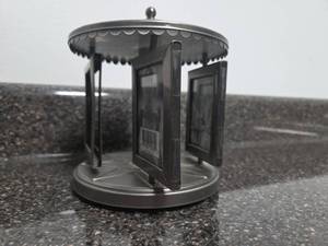 lot 311 image: Rotating Carousel Photo Frame with Umbrella Top 4 Photo Windows 5 Inches Tall