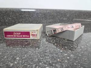 lot 316 image: VINTAGE Lufkin Junior Metallic Refill 50 ft Tape Measure 0663